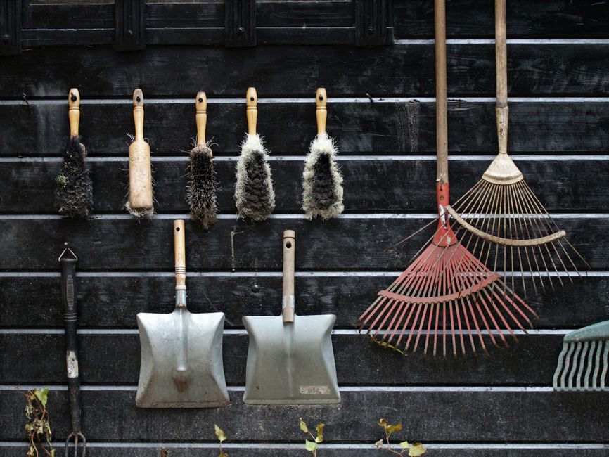 Build a Wall-Mounted Rack to Get Garden Tools Off the Shed Floor